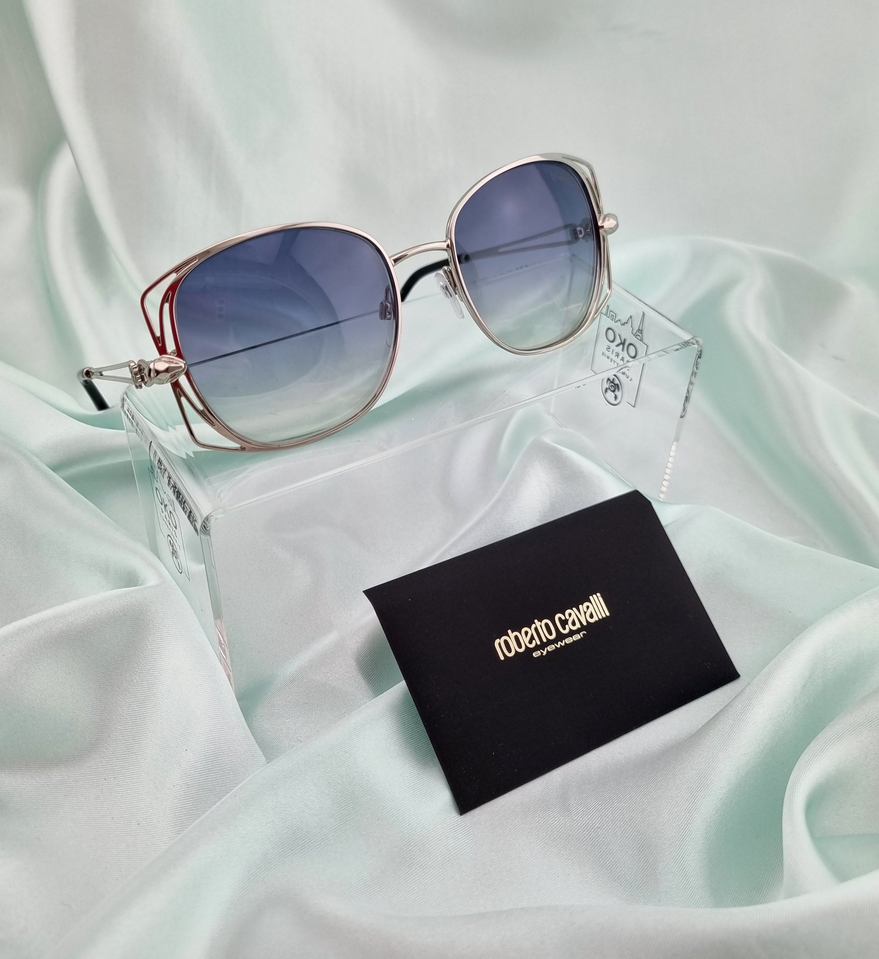 Mix of branded sunglasses Swarovski, Balenciaga, Roberto Cavalli, Valentino, Tom Ford, Dior