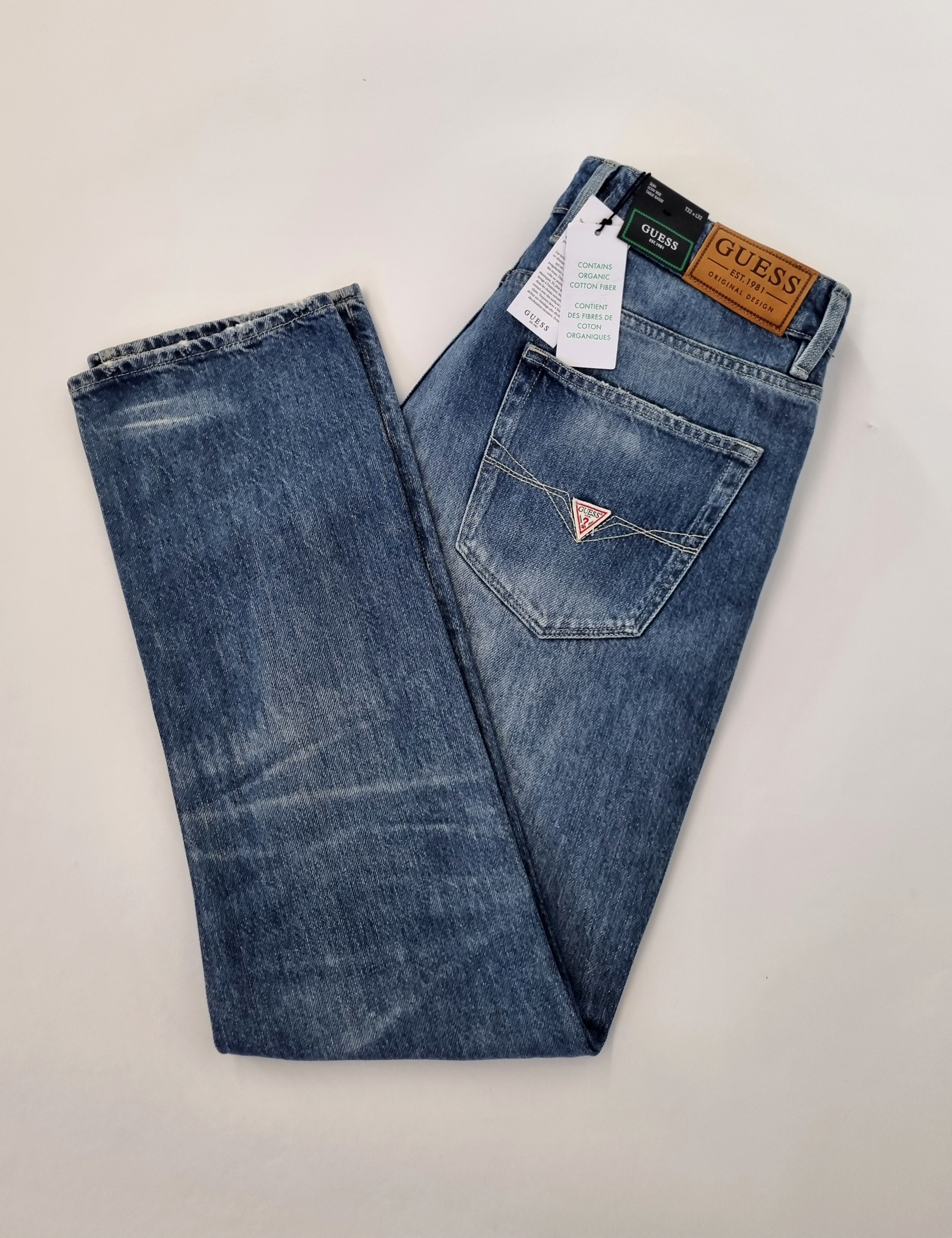 Mix of jeans and trousers by Guess