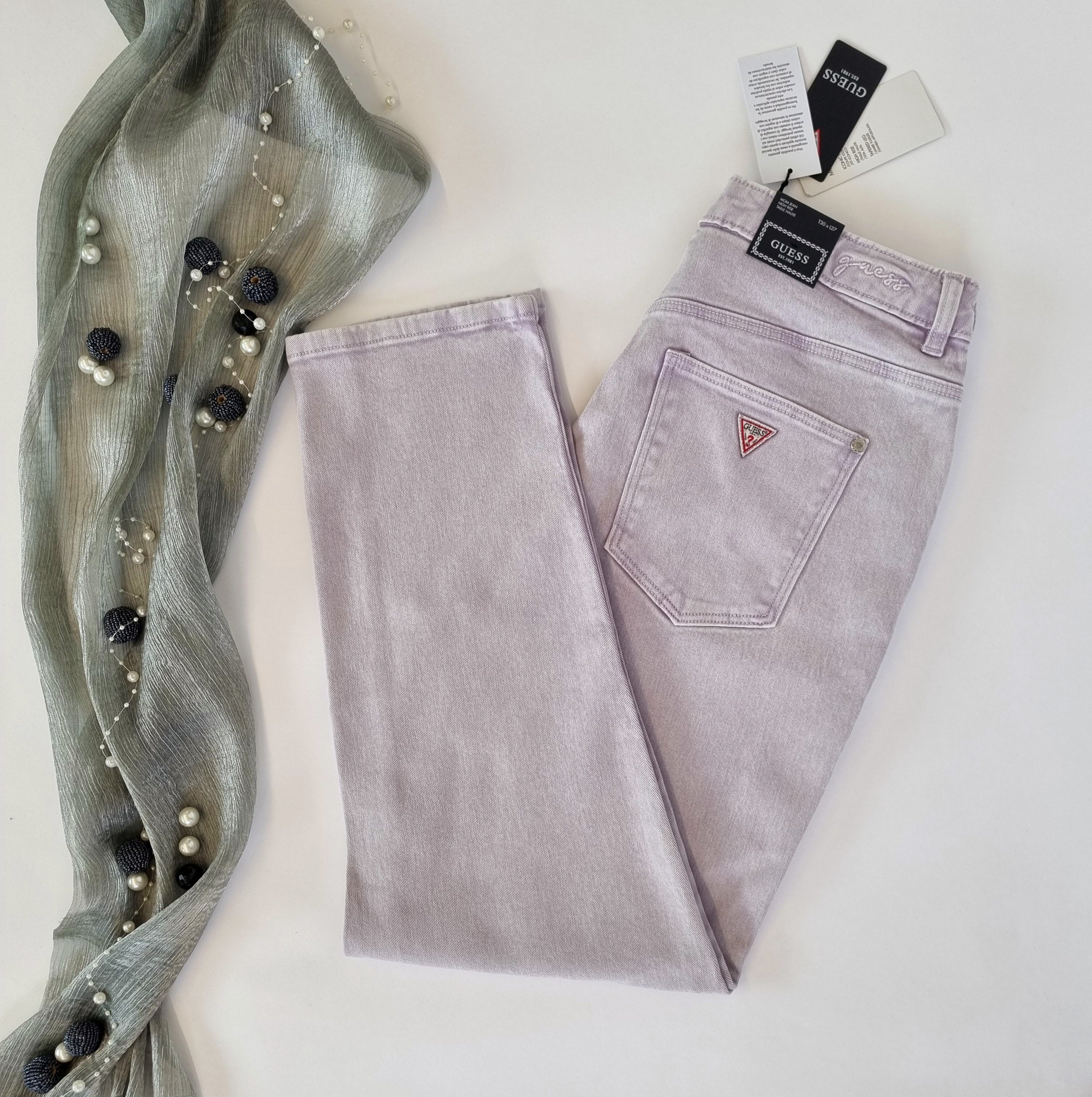 Mix of jeans and trousers by Guess