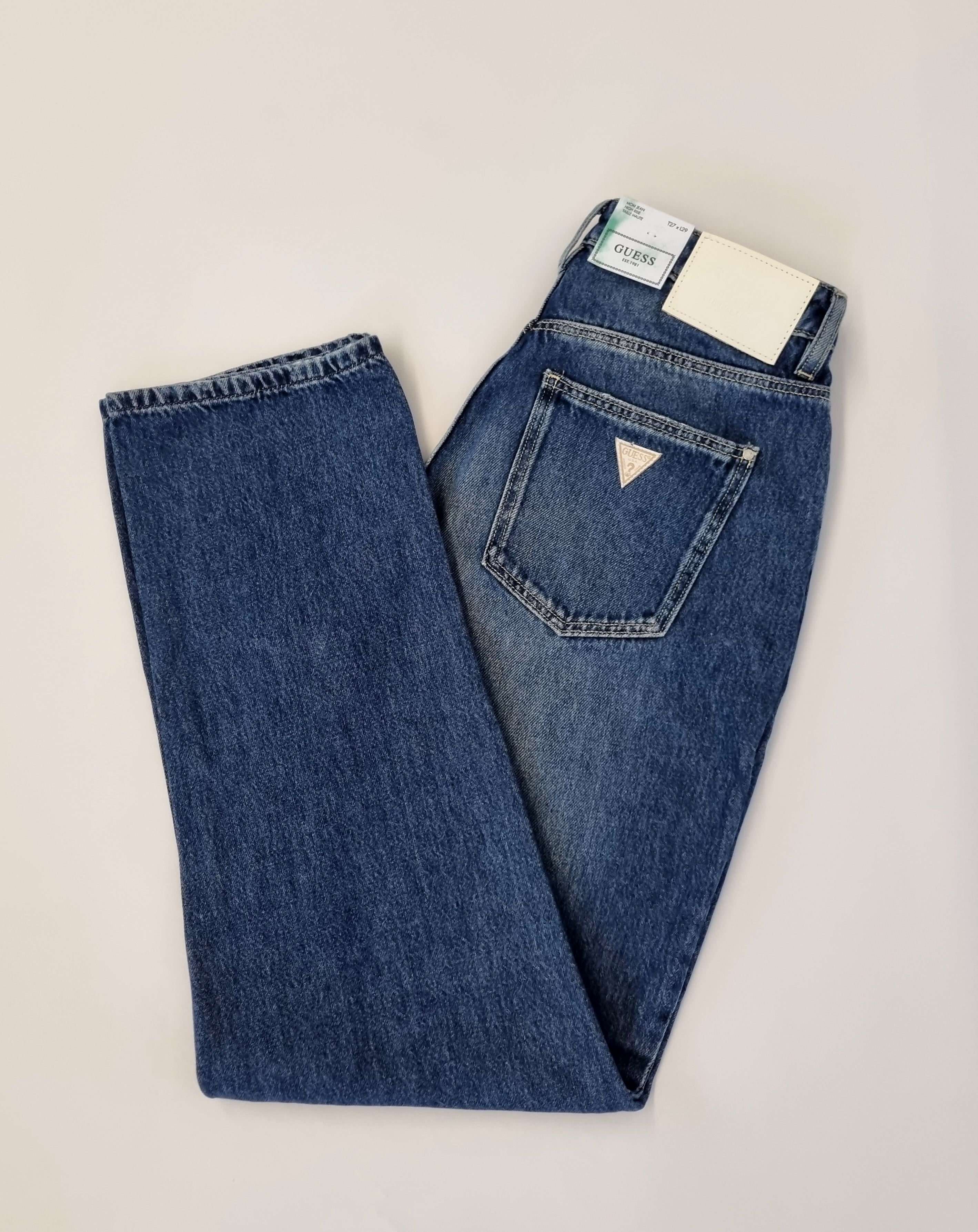 Mix of jeans and trousers by Guess