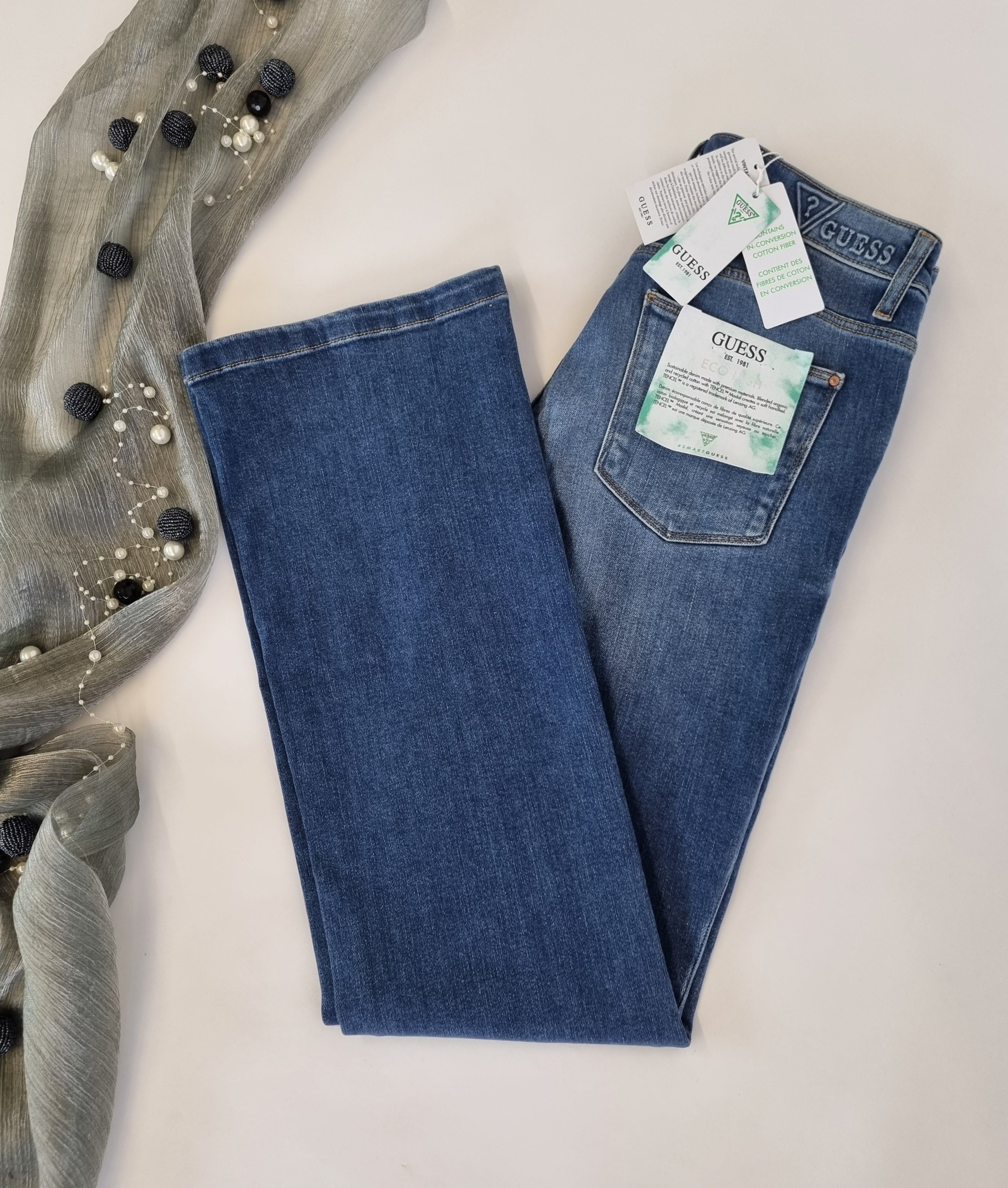 Mix of jeans and trousers by Guess