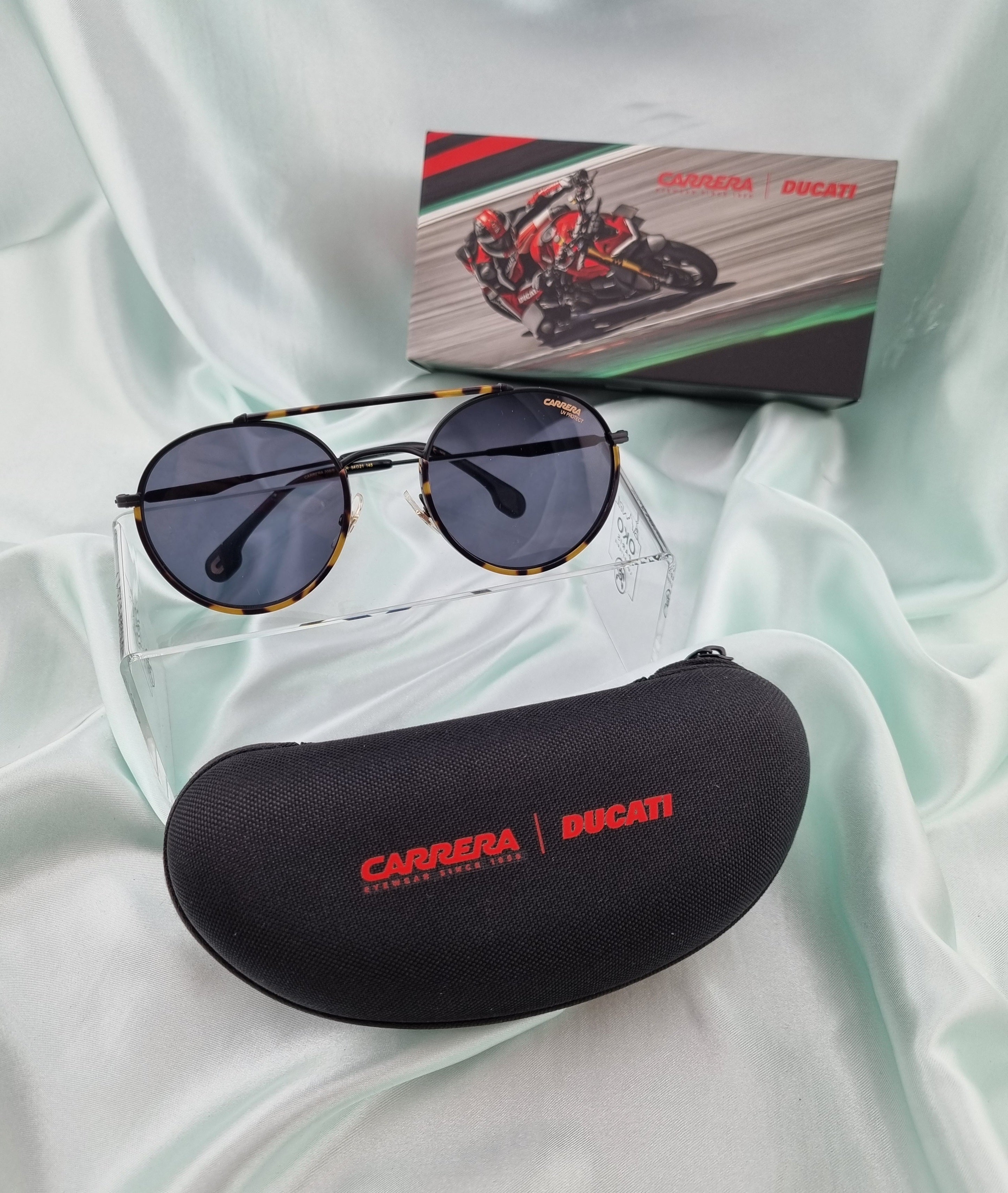 Mix of branded sunglasses Swarovski, Balenciaga, Roberto Cavalli, Valentino, Tom Ford, Dior